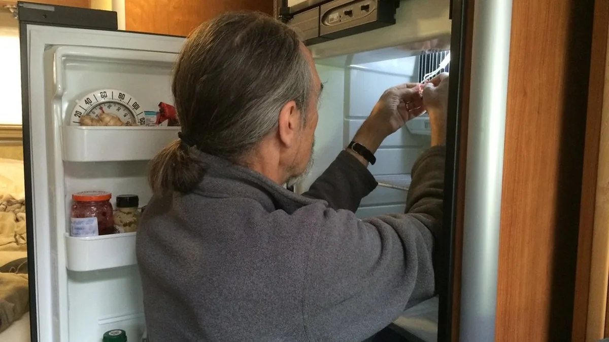 Appliance repair technician in Bartlesville Oklahoma Washington County refrigerator diagnosis honest local repair Mike